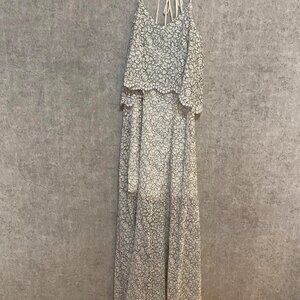 White lace maxi dress with open back, perfect for a special occasion